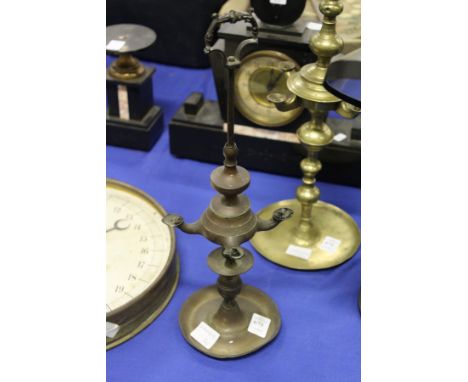 An eastern brass lamp.