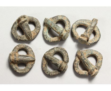 Small Roman bronze buckles / amulets.