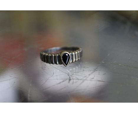 A silver ring.