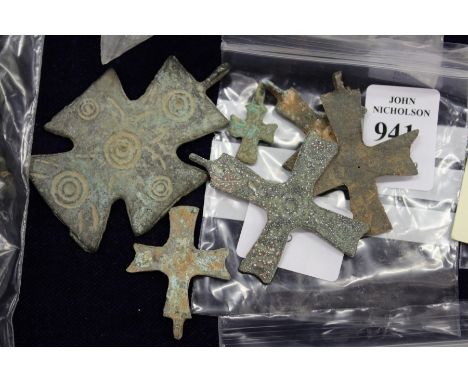 Small Roman bronze crosses.