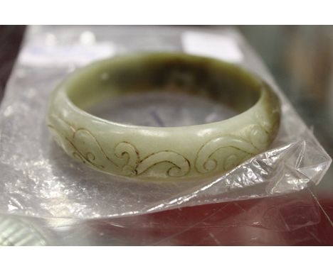 A Chinese jade bangle.