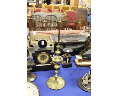 An eastern brass lamp.