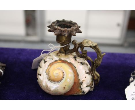 A shell candlestick.