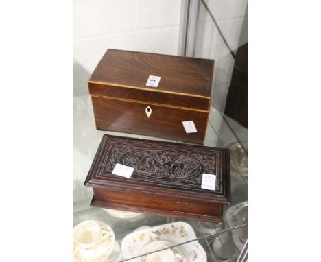 A mahogany tea caddy and a hardwood box.