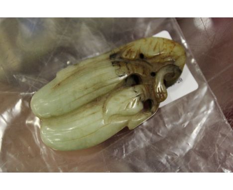 A Chinese carved jade pendant.