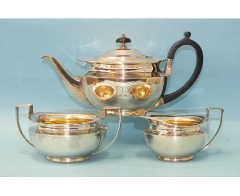 A silver teapot of compressed circular form, inscribed From Mary R to Phoebe Morshead, Nov 21st 1952, maker James Dixon &amp;