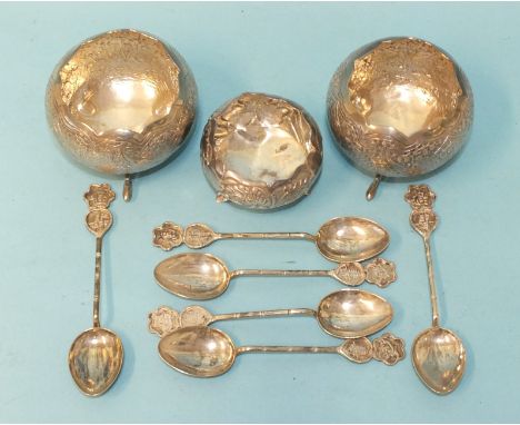 A set of six Oriental silver teaspoons with Chinese character terminals, marked '900 Silver', two small three-legged silver b