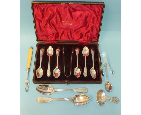 A cased set of six teaspoons and sugar tongs by Walker &amp; Hall, Sheffield 1906, a silver caddy spoon with pierced handle a