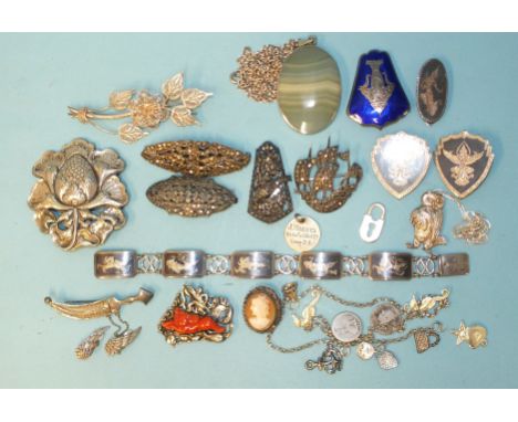 A Chinese silver-mounted coral horse clip and other silver and white metal jewellery. 