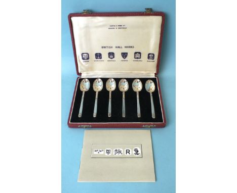 A cased set of six Mappin &amp; Webb silver teaspoons representing the British hallmarks, coronation year 1952, with leaflet.