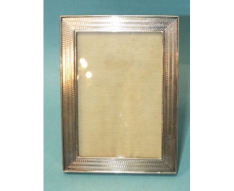 A Sampson Mordan &amp; Co. engine-turned silver rectangular photograph frame, 12 x 9cm, London 1913. 