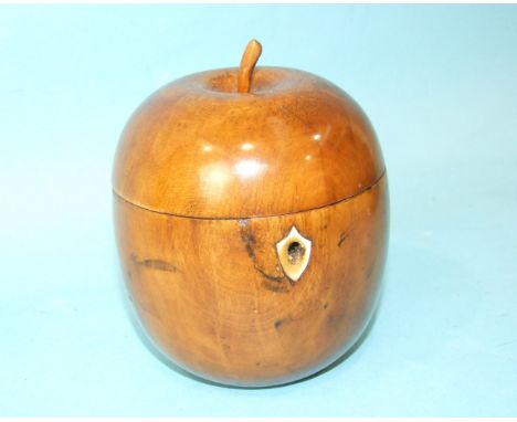 A 19th century tea caddy in the form of an apple, with later foil lining, 14cm high, (repair to lock), 14cm high. 