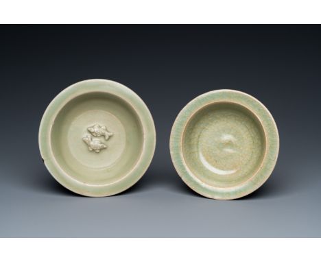 Fullt title: Two Chinese celadon-glazed bowls, one with twin fish, MingDescription: Dia.: 12,5 cm (the largest) Condition: (U