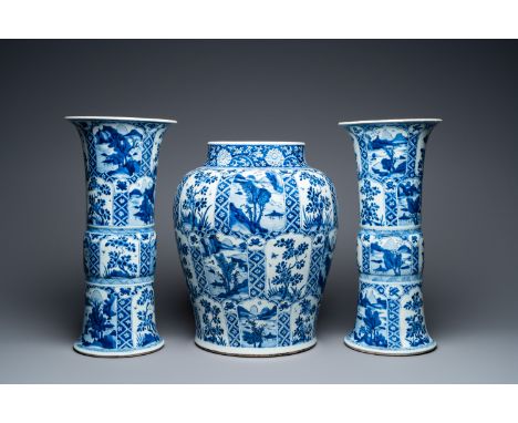 Fullt title: A large Chinese blue and white garniture of three vases, KangxiDescription: H.: 51,5 cm - 47 cm Condition: (UV-c