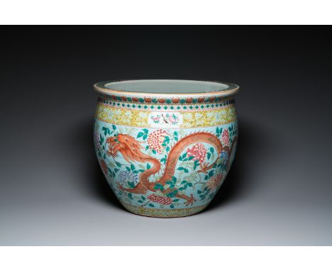 Fullt title: A large Chinese famille verte light blue-ground fish bowl, 19th C.Description: Dia.: 55 cm - H.: 47 cm Condition