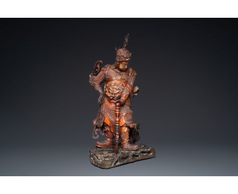 Fullt title: A very large Chinese gilt-lacquered wood figure of Weituo, 17th C.Description: H.: 145 cm Ref.:- Sotheby's, New 