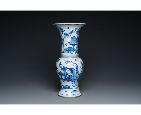 Fullt title: An unsual Chinese blue and white 'yenyen' vase with antiquities, KangxiDescription: H.: 46 cm Condition: (UV-che