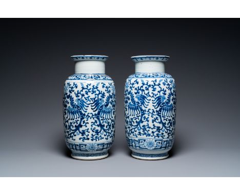 Fullt title: A pair of Chinese blue and white 'phoenix' vases, Kangxi mark, 19th C.Description: H.: 36 cm Condition: (UV-chec