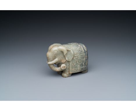 Fullt title: A Chinese grey-speckled celadon jade elephant, QingDescription: Dim.: 15 x 10 x 6,5 cm Condition: (UV-checked)- 