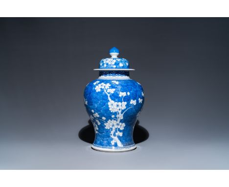 Fullt title: A Chinese blue and white 'prunus on cracked ice' vase and cover, KangxiDescription: H.: 42,5 cm