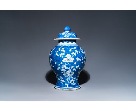 Fullt title: A Chinese blue and white 'prunus on cracked ice' vase and cover, KangxiDescription: H.: 45,5 cm