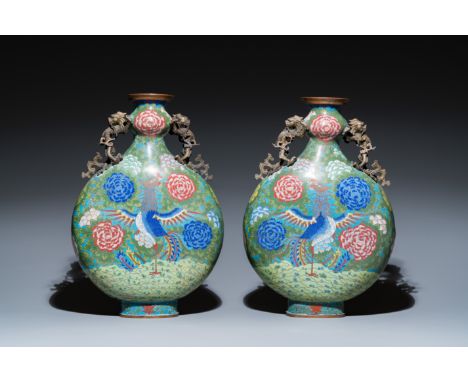 Fullt title: A pair of Chinese cloisonnŽ 'moonflask' vases, bianhu, JiaqingDescription: H.: 48 cm Condition: (UV-checked)- So