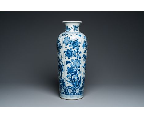 Fullt title: A large Chinese blue and white rouleau vase with floral design, KangxiDescription: H.: 56 cm Provenance:- An Eng