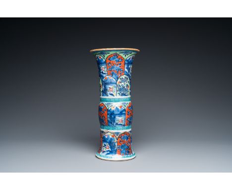 Fullt title: A Chinese blue and white 'gu' vase with European clobbered design, KangxiDescription: H.: 34 cm