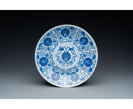 Fullt title: A Chinese blue and white 'lotus scroll' dish, Guangxu mark and of the periodDescription: Dia.: 25 cm Condition: 
