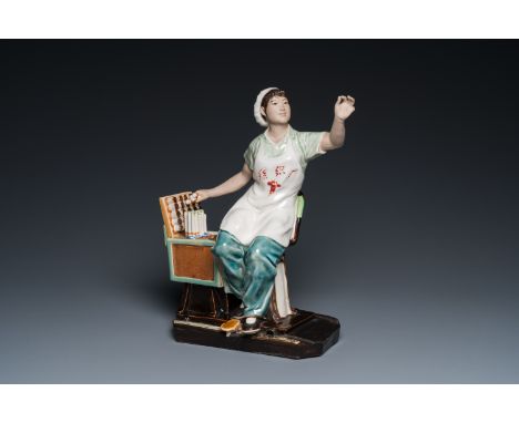 Fullt title: A Chinese Cultural Revolution figure of a cotton weaver, ca. 1970Description: H.: 29,5 cm - L.: 23,5 cm Provenan