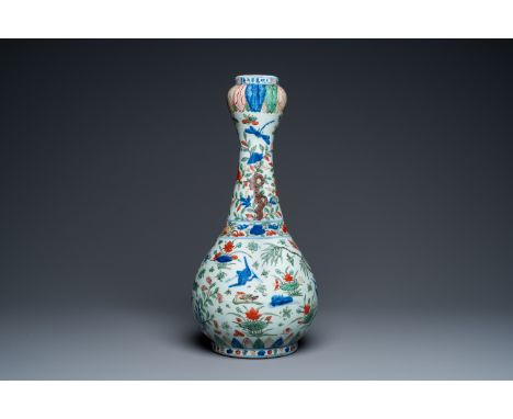 Fullt title: A Chinese wucai garlic-mouth bottle vase, Wanli mark and of the periodDescription: H.: 45,5 cm Provenance: A Bel