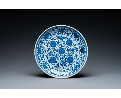 Fullt title: A Chinese blue and white 'lotus scroll' dish, QianlongDescription: Dia.: 27 cm