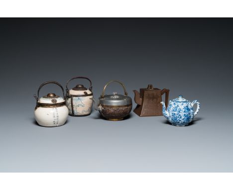 Fullt title: Two Vietnamese blue and white water pipes, a blue and white 'lotus' teapot, a Yixing teapot and a coconut teapot