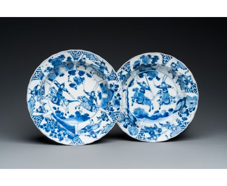 Fullt title: A pair of Chinese blue and white 'Mu Guiying' plates, Kangxi mark and of the periodDescription: Dia.: 23,5 cm Co