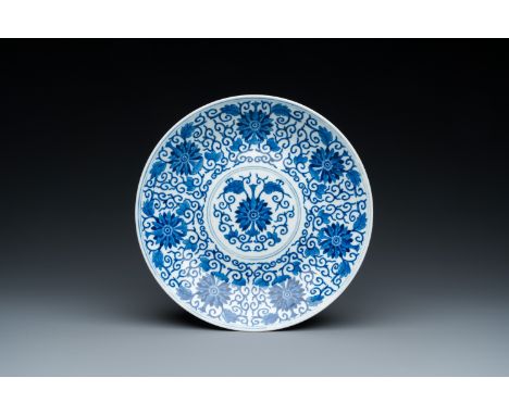 Fullt title: A Chinese blue and white 'lotus scroll' dish, Guangxu mark and of the periodDescription: Dia.: 25 cm Condition: 