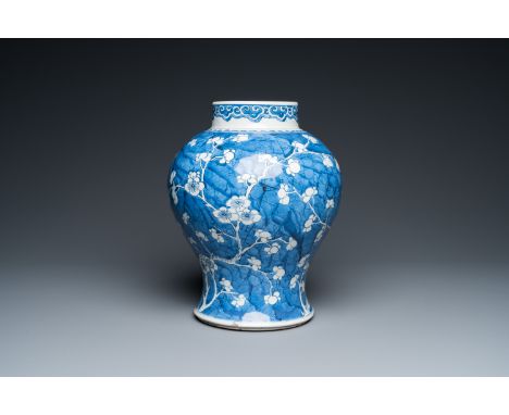 Fullt title: A Chinese blue and white 'prunus on cracked ice' vase, KangxiDescription: H.: 31,5 cm