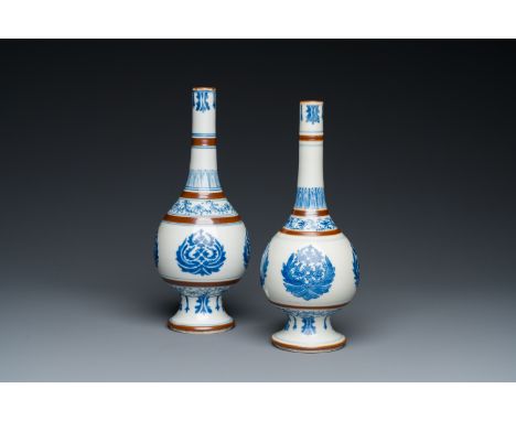 Fullt title: A pair of Chinese blue and white 'Baoxiang' sprinklers, KangxiDescription: H.: 24 cm (the tallest) Condition: (U
