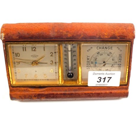 A Smiths combination travelling clock, barometer and thermometer