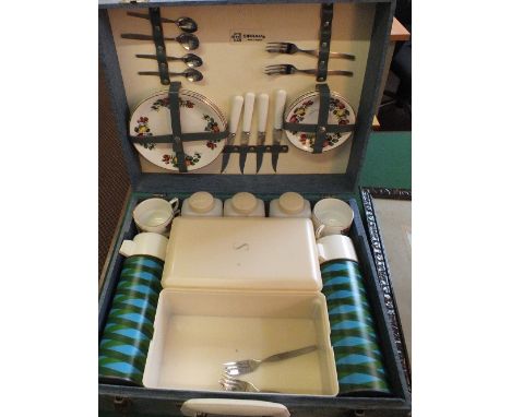 A leather case containing Brass wall lights, Sirram picnic case, shooting stick, folding stool plus two pictures