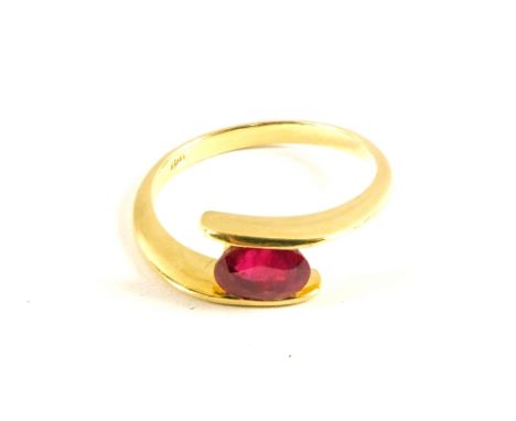 A single Ruby set ring, stamped 750, size O