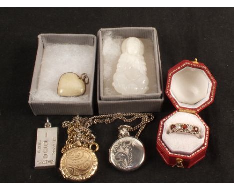 A small quantity of Silver and white metal jewellery including ring, photo locket, ingot etc