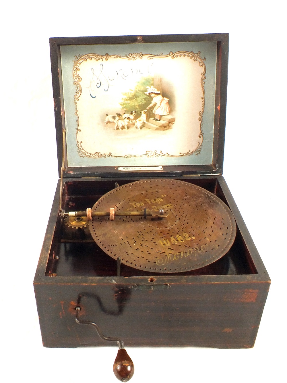 A Victorian Sonopol polyphon disc player with girl and dog print to lid ...