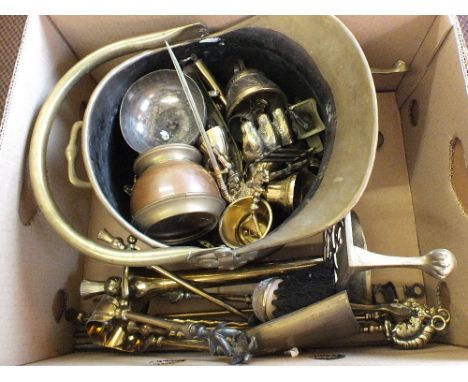 A Brass coal helmet, trivet plus other Brassware