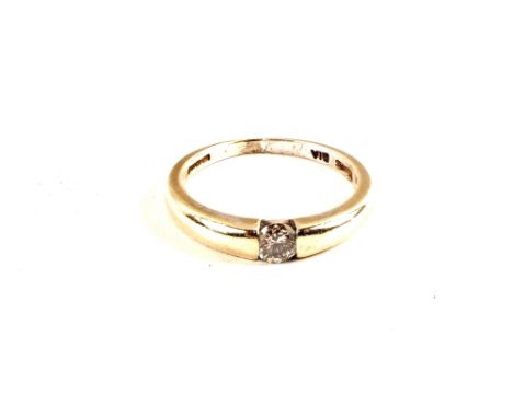 A 9ct White Gold solitaire Diamond ring in rub over setting, approx 0.2cts, size K
