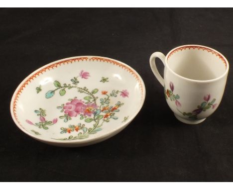 A Lowestoft polychrome Curtis pattern cup and saucer, cup height 2 1/2", saucer dia 4 3/4", light rim chip to saucer