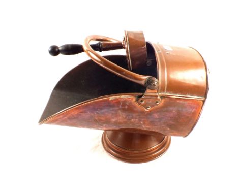 A 19th Century Copper coal helmet and shovel