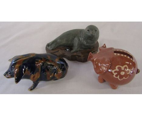 Norah Bailey pig dated 1940 with inscription H 5 cm, pottery pig by P Kay and a John Bourdeaux pottery model of a seal L 18 c