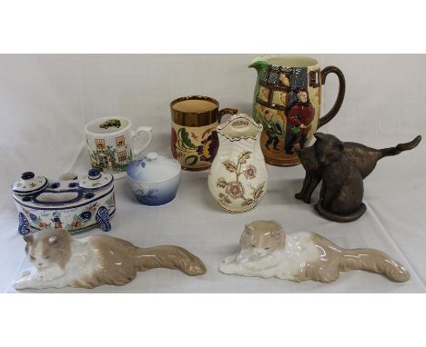 Faience ink stand marked HB Quimper , 2 Nao reclining cats (Gato de Angora), large Beswick Falstaff jug (af), Bing &amp; Gron