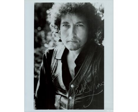 Bob Dylan signed 10x8 black and white promo photo. Good condition. All autographs come with a Certificate of Authenticity. We