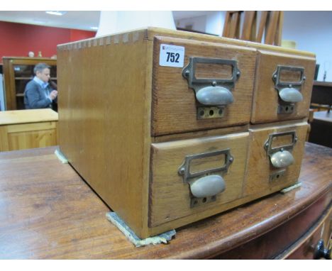 A Circa 1940's Light Oak Filing Chest, fitted with two banks of two drawers, brass handles and name plate frames.